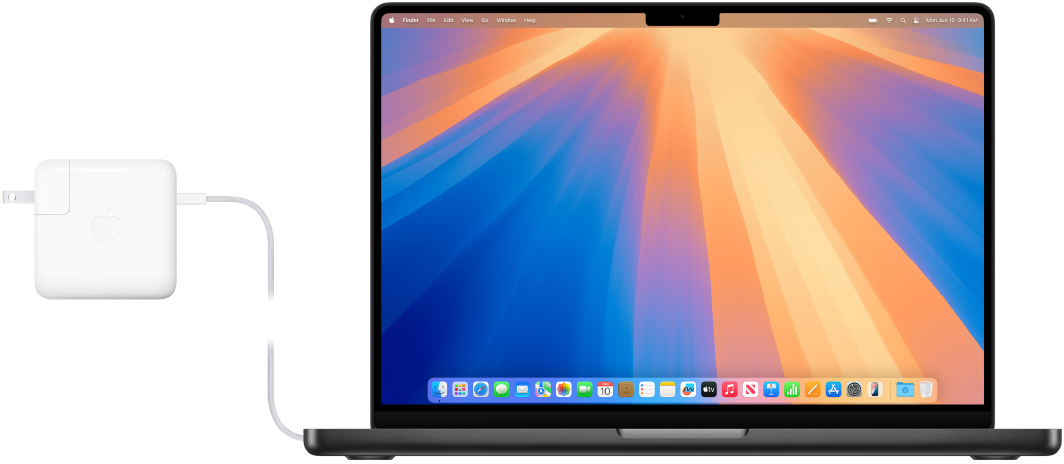 MacBook Pro مقاس 14 بوصة متصل بمحول الطاقة.