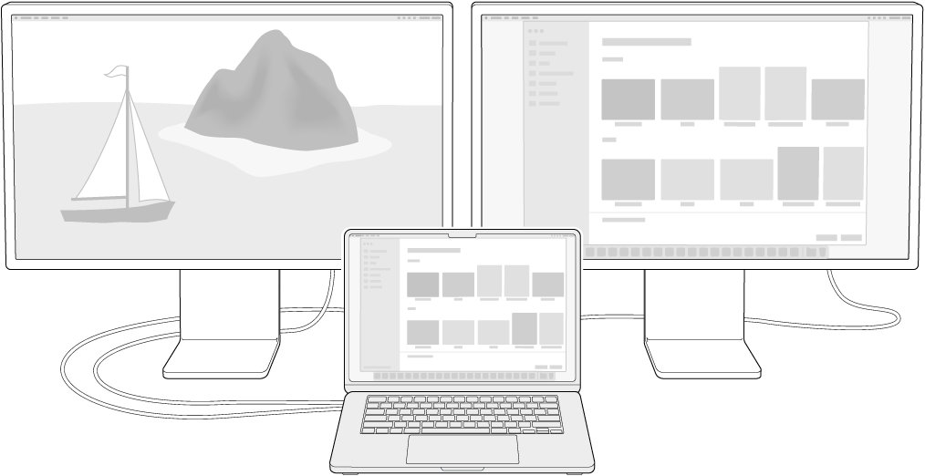 جهاز MacBook Air بجوار شاشتي Studio Display مستخدمتين كشاشتي عرض خارجية.