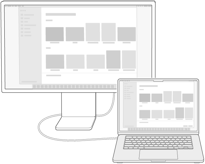شاشة عرض متصلة بكمبيوتر MacBook Air حيث تتم محاكاة سطح المكتب على كلتا الشاشتين.