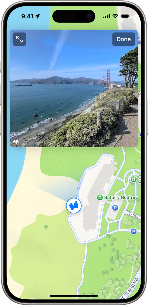 A moveable, 360-degree panoramic view appears above a map of the area marked in the Maps app. The Look Around icon overlaid on the map points in the direction of the view.