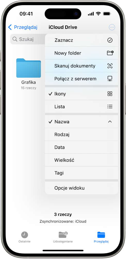 Aplikacja Pliki z zaznaczonym przyciskiem Więcej. Wyświetlone jest menu zawierające następujące polecenia: Zaznacz, Nowy folder, Skanuj dokumenty oraz Połącz z serwerem. Poniżej znajdują się opcje dotyczące wyświetlania rzeczy jako ikon i jako listy. Na dole widoczne są opcje sortowania: Nazwa, Rodzaj, Data, Wielkość oraz Tagi. Jeszcze niżej znajduje się pozycja Opcje widoku.